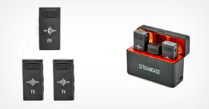 Three black wireless microphone transmitters with a receiver, displaying signal icons. Next to them is an open black charging case with red lining labeled "STR3AMCASE," holding the devices securely inside.