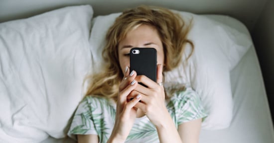 Teen looking at smartphone