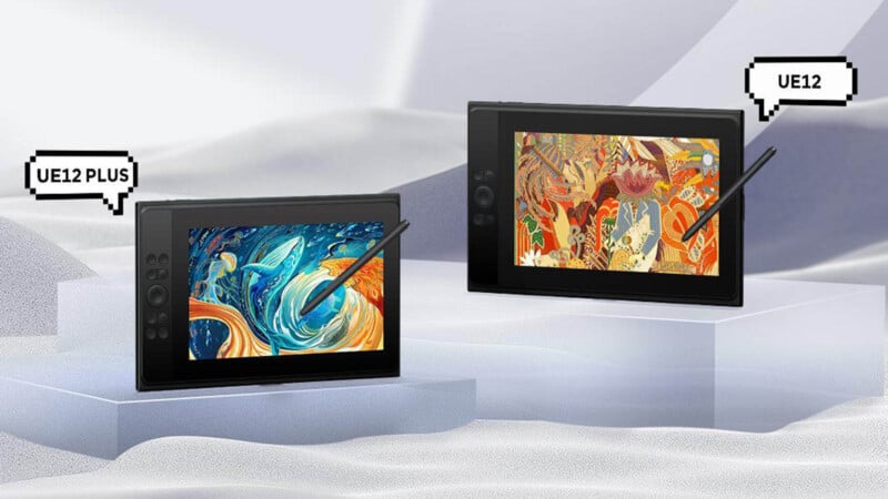 Two digital tablets with styluses are displayed on abstract white pedestals. The left tablet shows a blue and orange wave illustration, labeled "UE12 PLUS." The right tablet features a colorful, intricate design, labeled "UE12." Speech bubble labels are included.