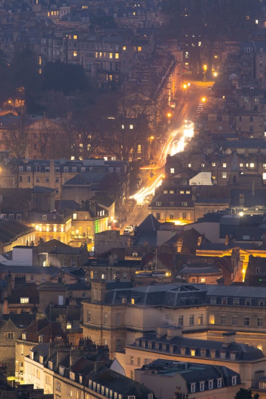 Low light cityscape with traffic trails