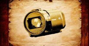 A vintage-style poster featuring a Panasonic 4K camera lens against a textured, aged paper background with brown border edges. The lens is prominently displayed, emphasizing its details and modern design.