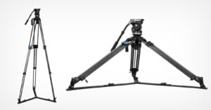 Two camera tripods are shown: the one on the left is tall, standing upright with three extended legs, and the one on the right is shorter with its legs spread widely apart and mounted on a horizontal slider for low-angle shots.