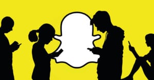 Silhouettes of four people using smartphones, set against a bright yellow background featuring the large white Snapchat ghost logo.