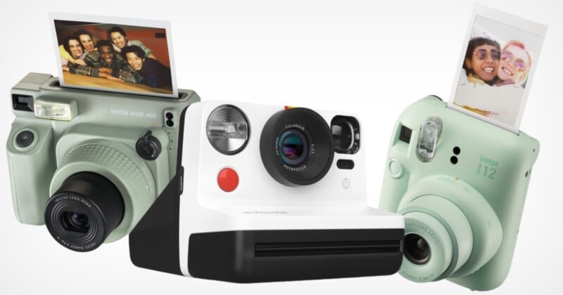 Three instant cameras are displayed. The one on the left is green with a top photo slot showing a group photo. The center camera is white with a black lens. The one on the right is mint green, also with a photo slot displaying a selfie.