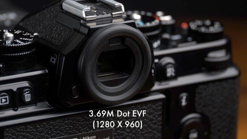 Close-up shot of a black camera, focusing on the electronic viewfinder (EVF). The text "3.69M Dot EVF (1280 X 960)" is overlaid at the bottom center of the image, highlighting the EVF specifications.