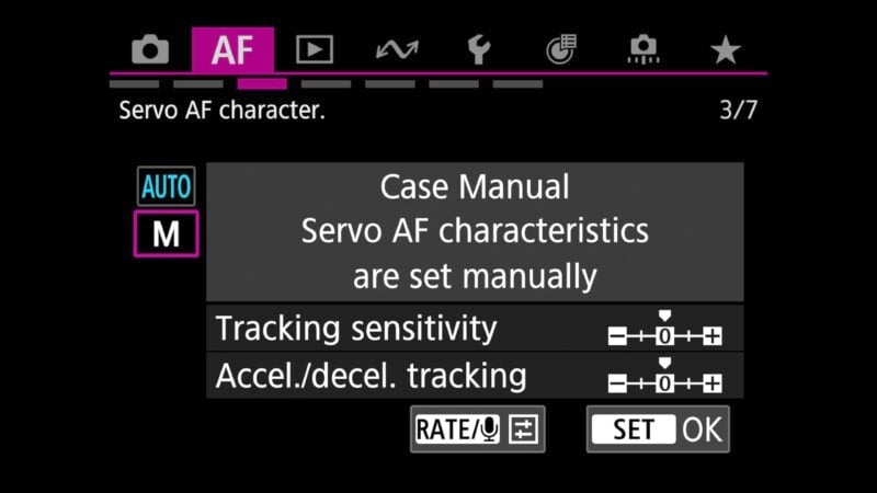 Camera settings menu displaying "Servo AF characteristics are set manually" with options for tracking sensitivity and acceleration/deceleration tracking. Controls for adjusting settings are visible, with buttons for "RATE" and "SET.